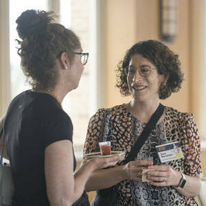 Two Athena in Action participants in the lobby