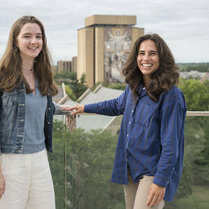 Two Athena in Action participants on the balcony