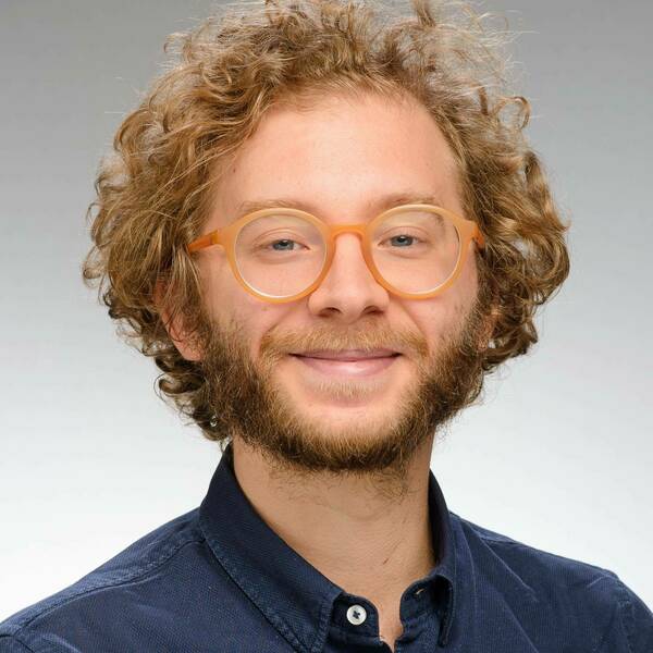 Nuno Moniz headshot in blue shirt