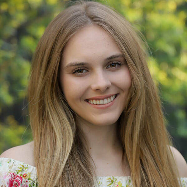 Headshot of Katharine Steffes in floral top.