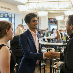 Group of smiling people in conversation